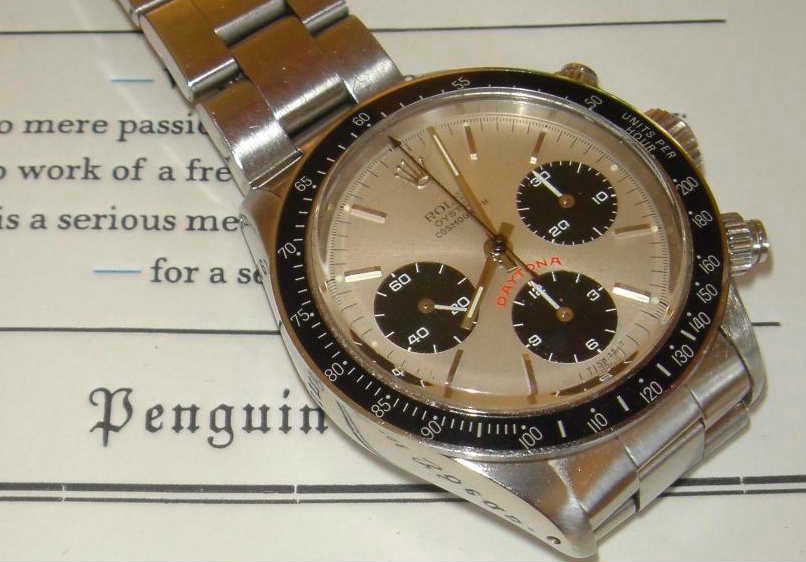 Rolex Daytona i stål med ljus urtavla, tre svarta mätare och svart lünett med tachymeterskala
