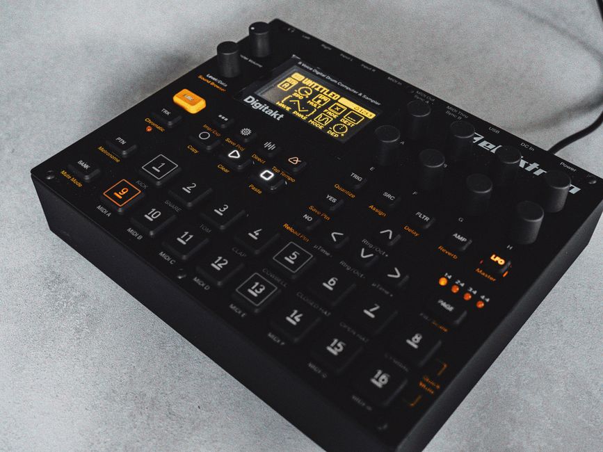 An Akai MPC standalone groovebox with pads and a screen