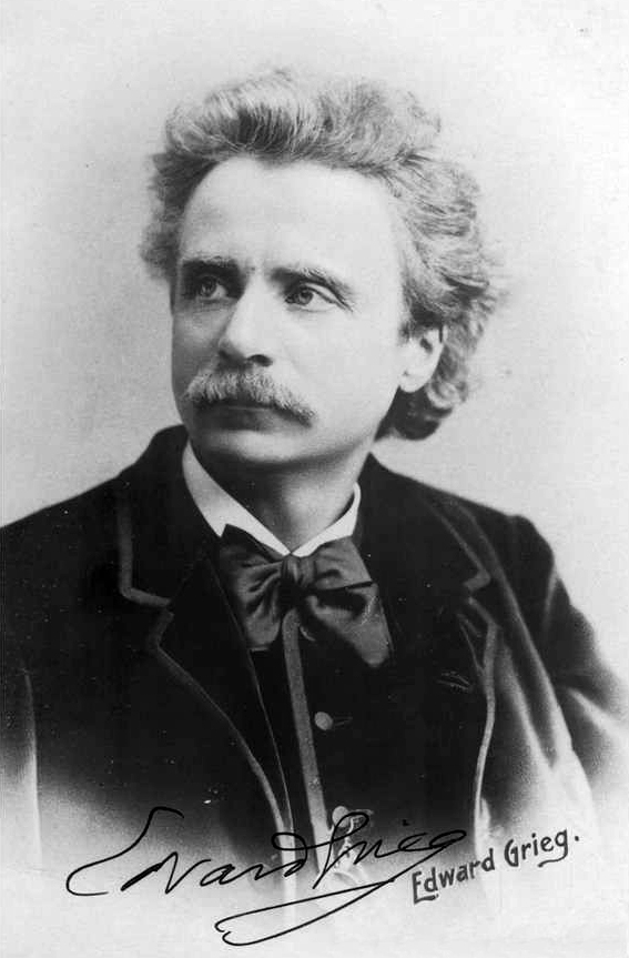Edvard Grieg, svartvitt porträtt från 1888 med hans namnteckning