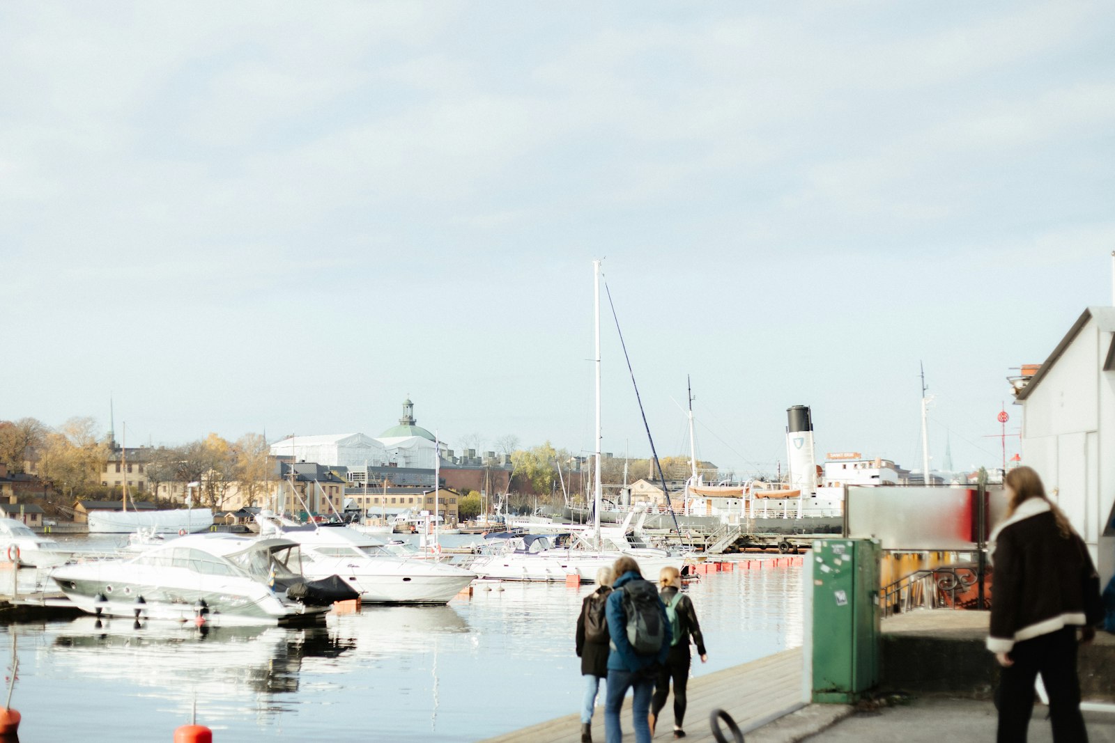 People walking by the Stockholm waterfront
