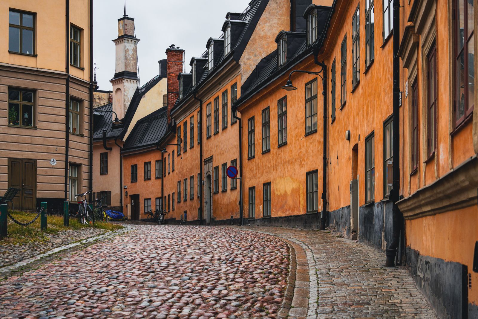 A cobbled street lined with historic houses in Stockholm