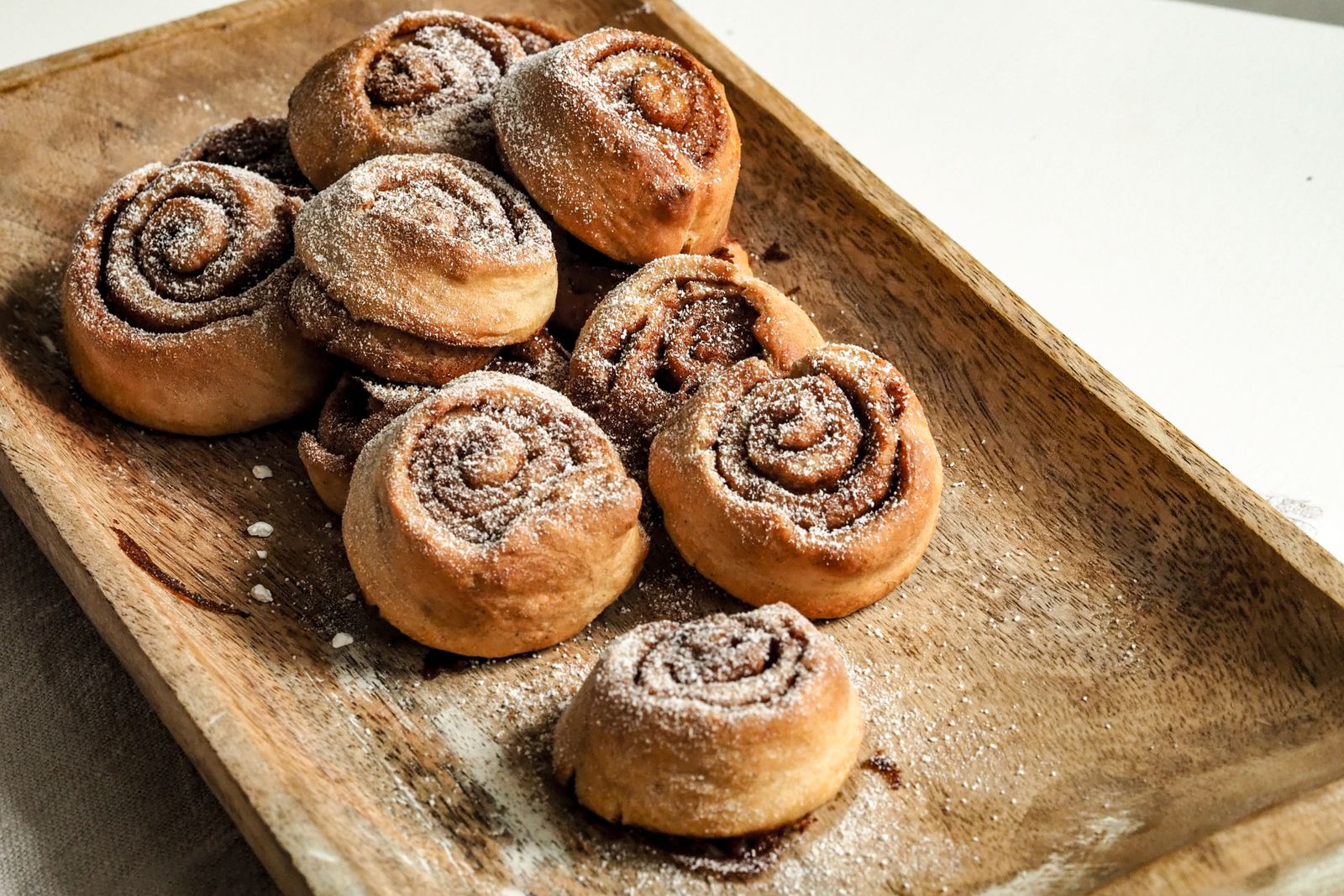 Freshly baked Swedish cinnamon buns dusted with sugar