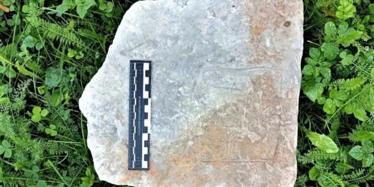 archaeologists-find-500-year-old-board-game-carved-in-ruins-of-polish-castle