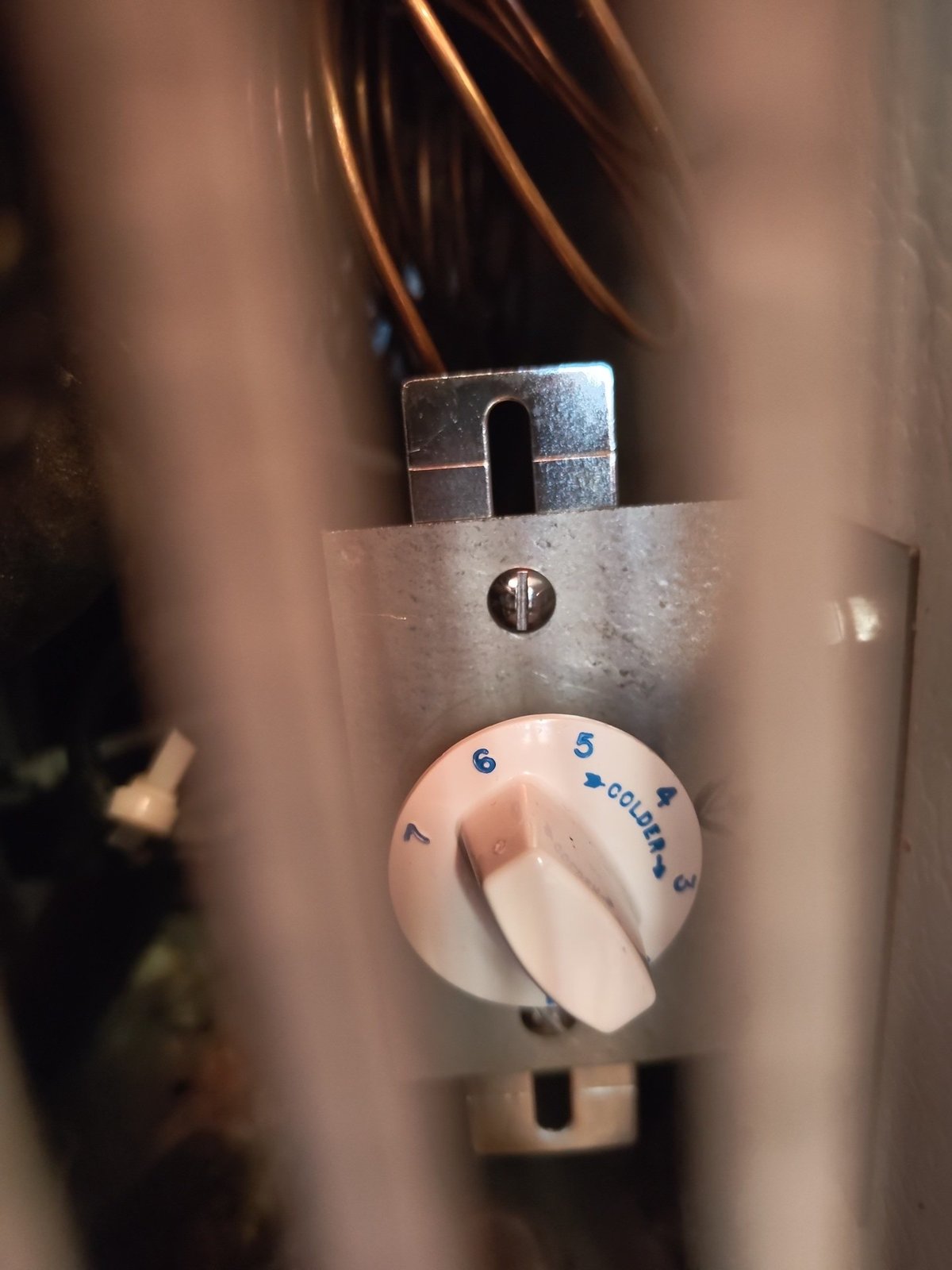 how-would-you-turn-this-dial-to-make-the-freezer-colder?