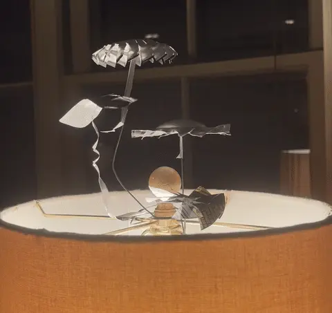 show-hn:-lamp-carousel-–-diy-kinetic-sculpture-powered-by-lamp-heat