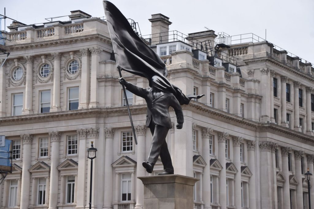 statue-of-a-man-blinded-by-a-flag-put-up-by-banksy-in-central-london