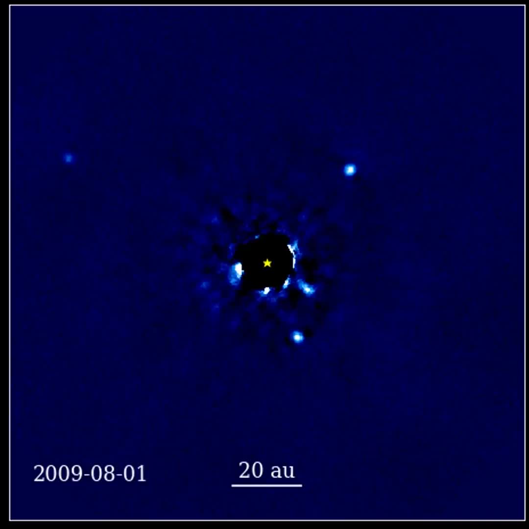 a-12-year-sequence-of-telescope-images-of-a-star-and-four-planets-orbiting